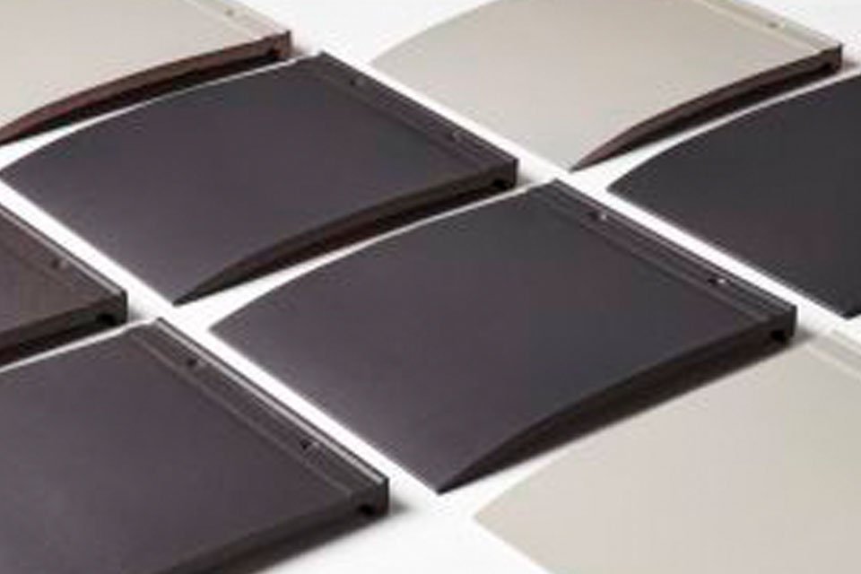 Tuiles plates pour la couverture de toiture