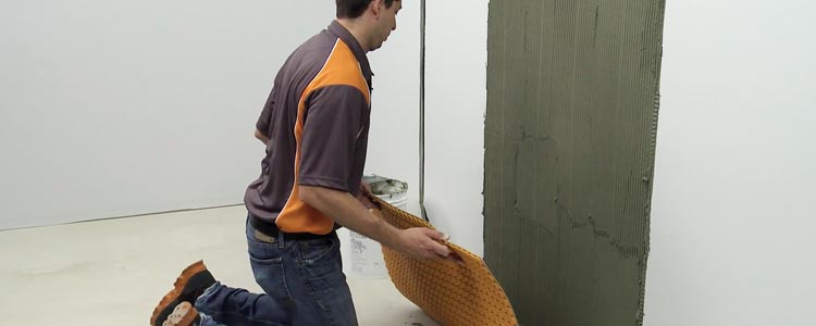 douche chauffante avec natte isolante